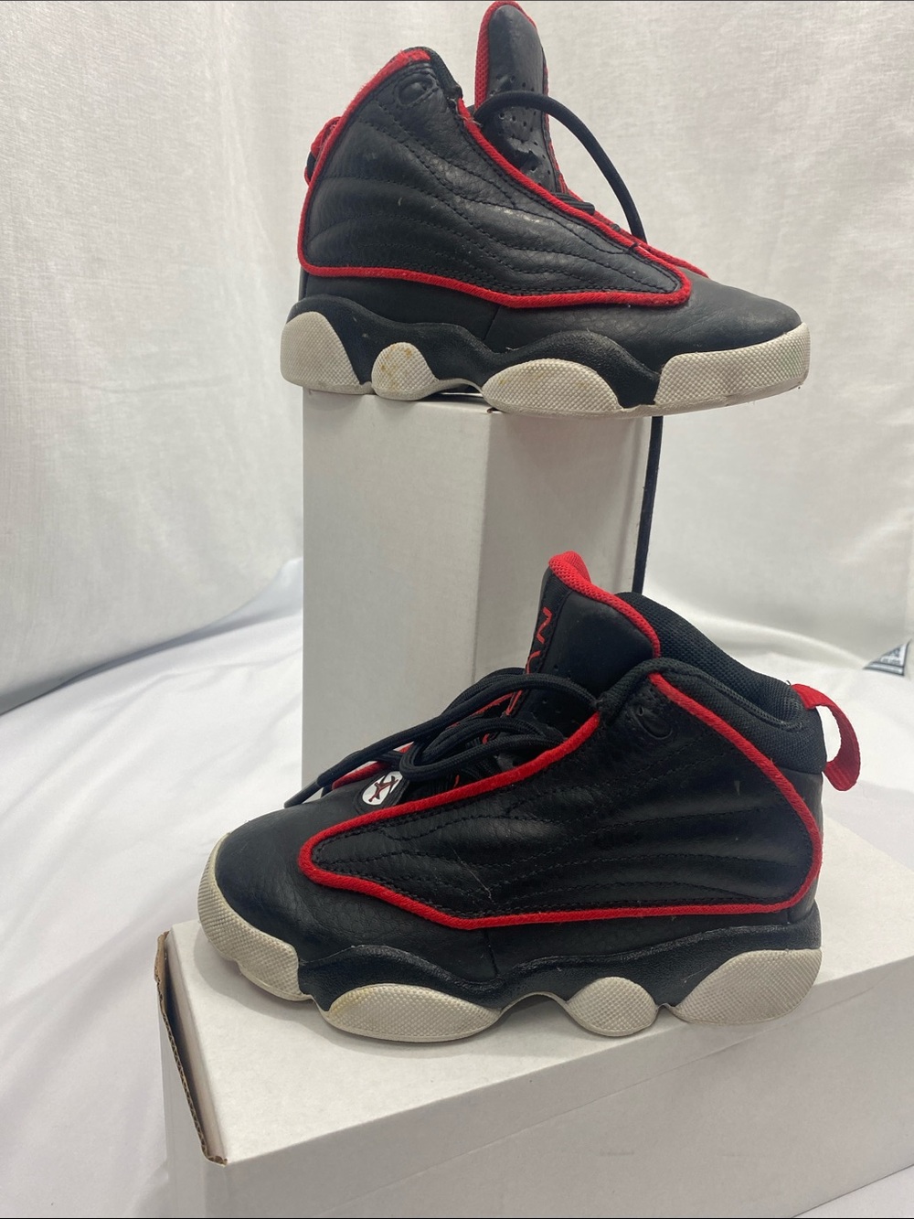 Jordan Kids Black and Red High-Top Sneakers